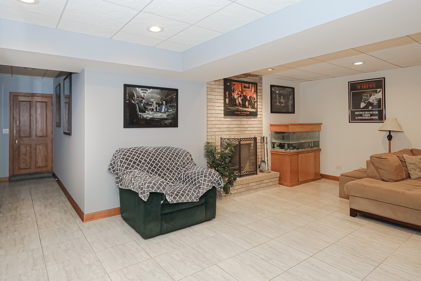307 79th Street Burr Ridge, IL 60527 - Photo 33 of 41 a living room with furniture and a flat screen tv