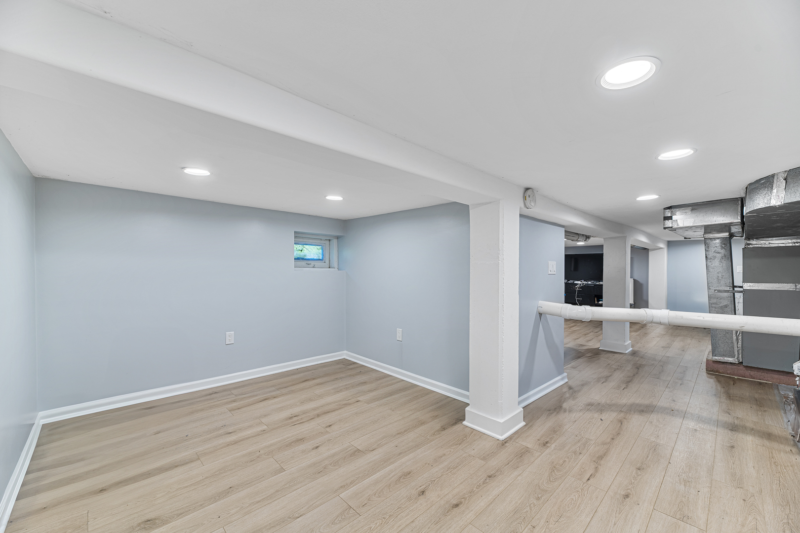 1S217 Valley Road Lombard, IL 60148 - Photo 13 of 25 a view of a big room with wooden floor and windows