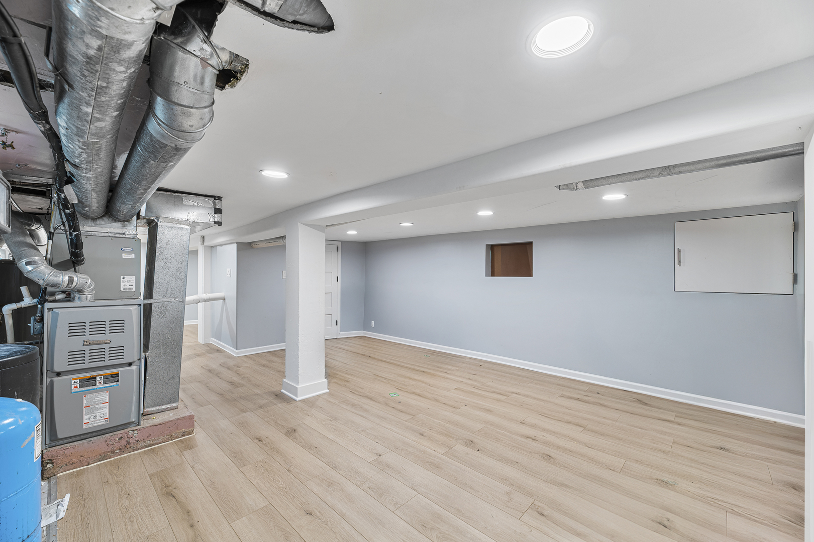 1S217 Valley Road Lombard, IL 60148 - Photo 14 of 25 an empty room with wooden floor and staircase