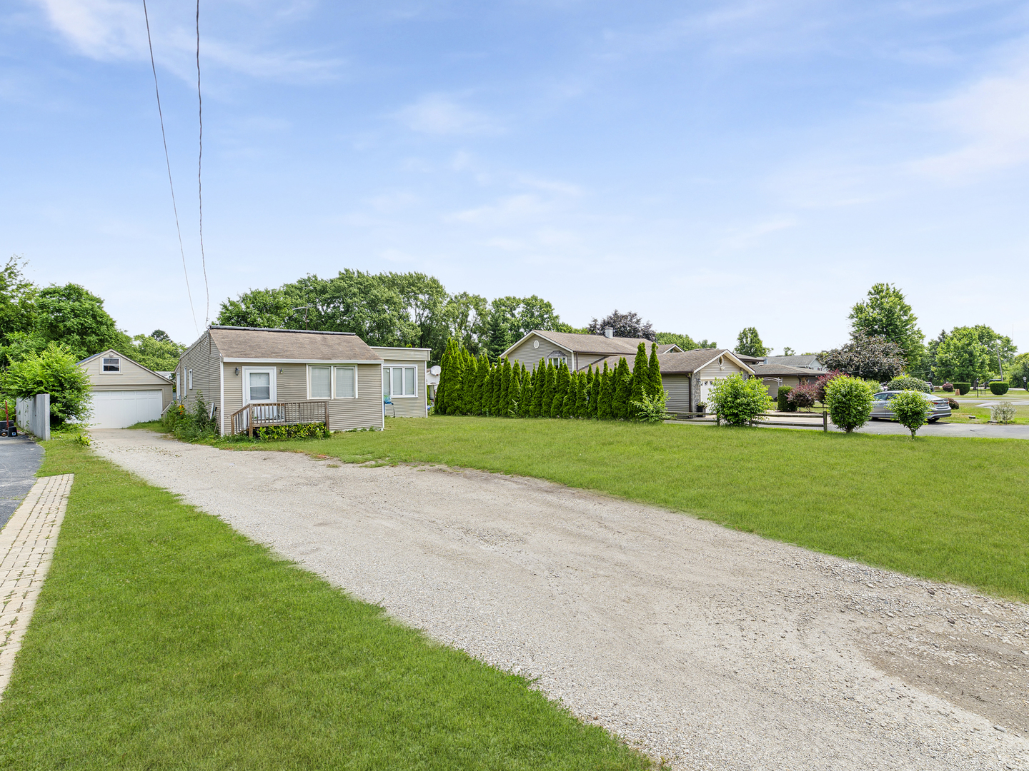 1S217 Valley Road Lombard, IL 60148 - Photo 17 of 25 a view of a house with a big yard plants and large trees