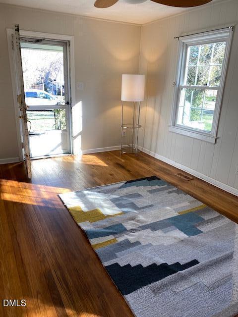2106 Tudor Place Raleigh, NC 27610 - Photo 2 of 11 a view of empty room with wooden floor