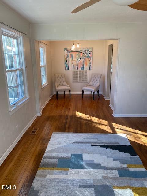 2106 Tudor Place Raleigh, NC 27610 - Photo 3 of 11 a living room with furniture and a wooden floor