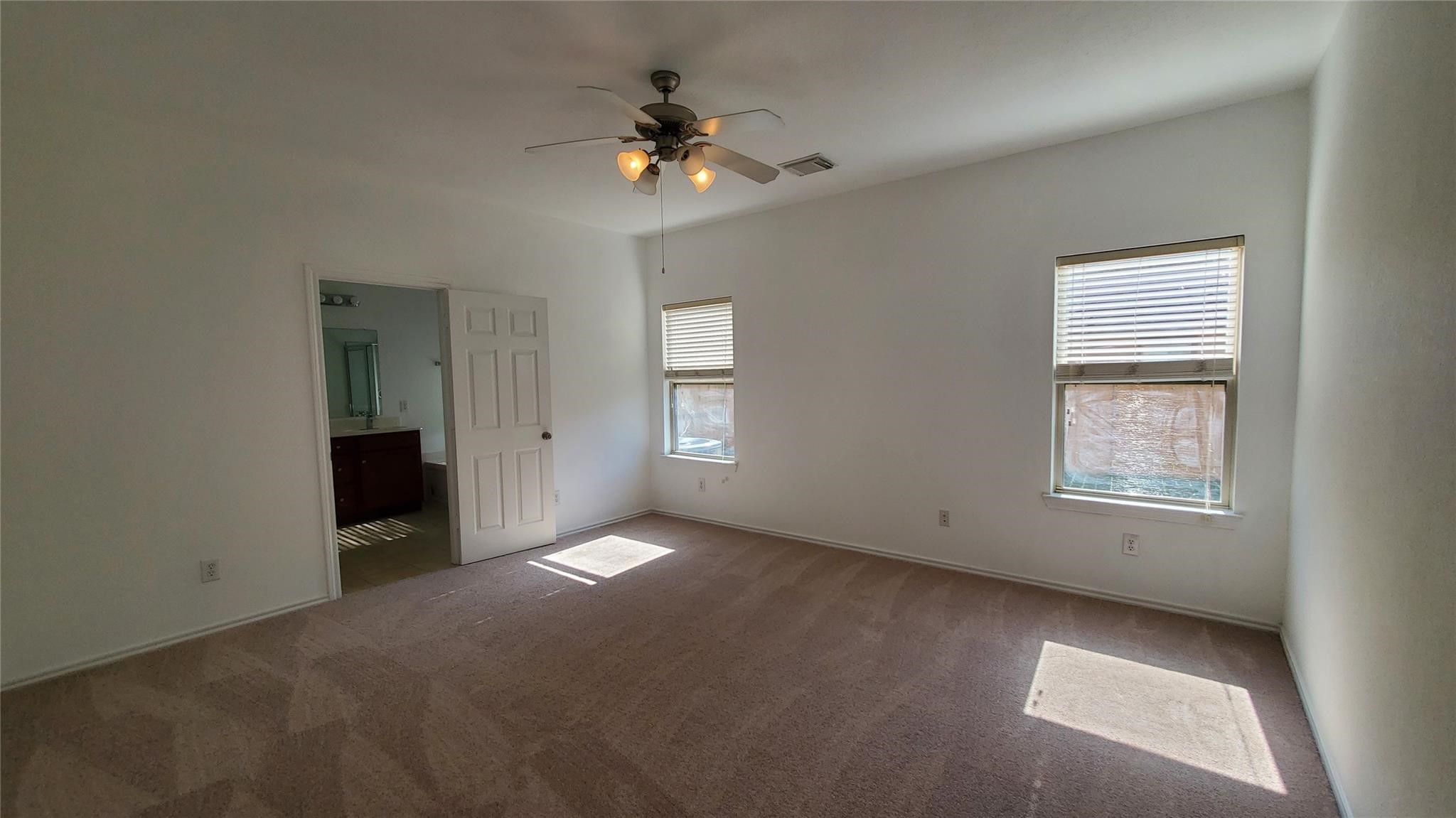 2814 Silver Point Lane Rosharon, TX 77583 - Photo 23 of 29 a view of an empty room with a window