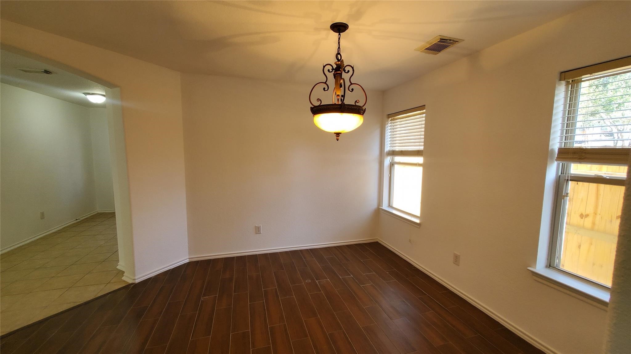 2814 Silver Point Lane Rosharon, TX 77583 - Photo 24 of 29 a view of a room with wooden floor and windows