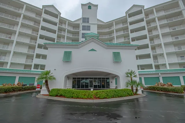 a front view of a building with balcony