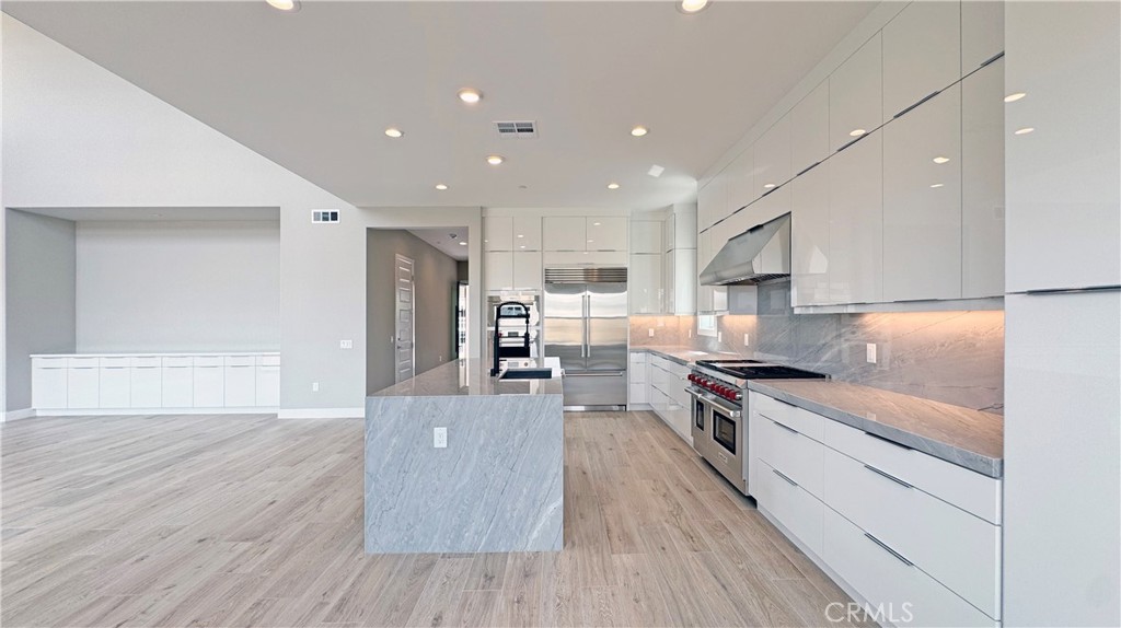 217 Stage Irvine, CA 92618 - Photo 11 of 26 a large kitchen with stainless steel appliances lots of counter top space