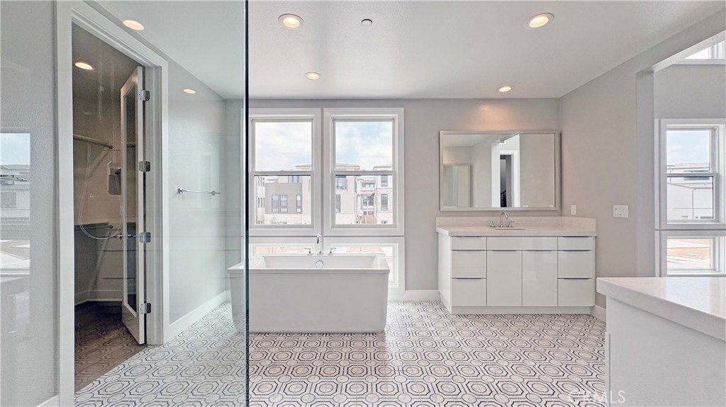 217 Stage Irvine, CA 92618 - Photo 16 of 26 a bathroom with a tub shower and sink