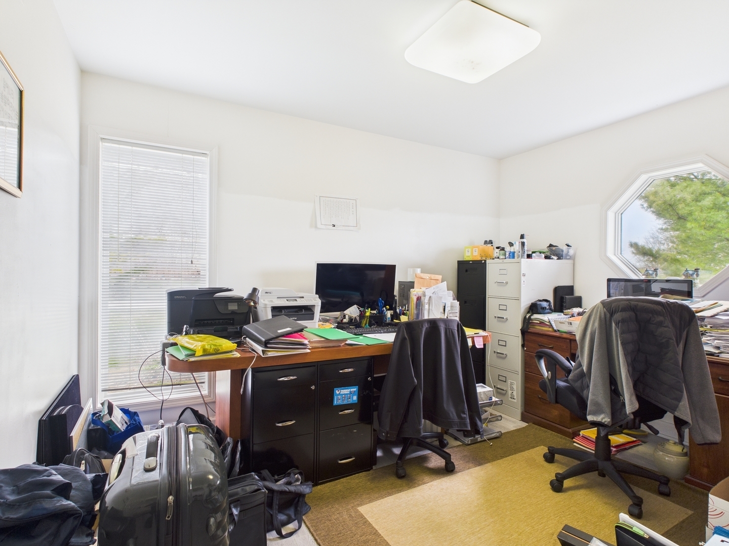 15840 Overlook Lane Huntley, IL 60142 - Photo 19 of 42 a view of a workspace with furniture and a window
