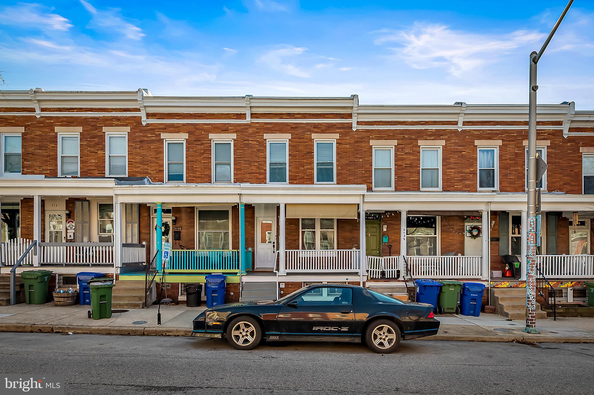 a car parked in front of a building