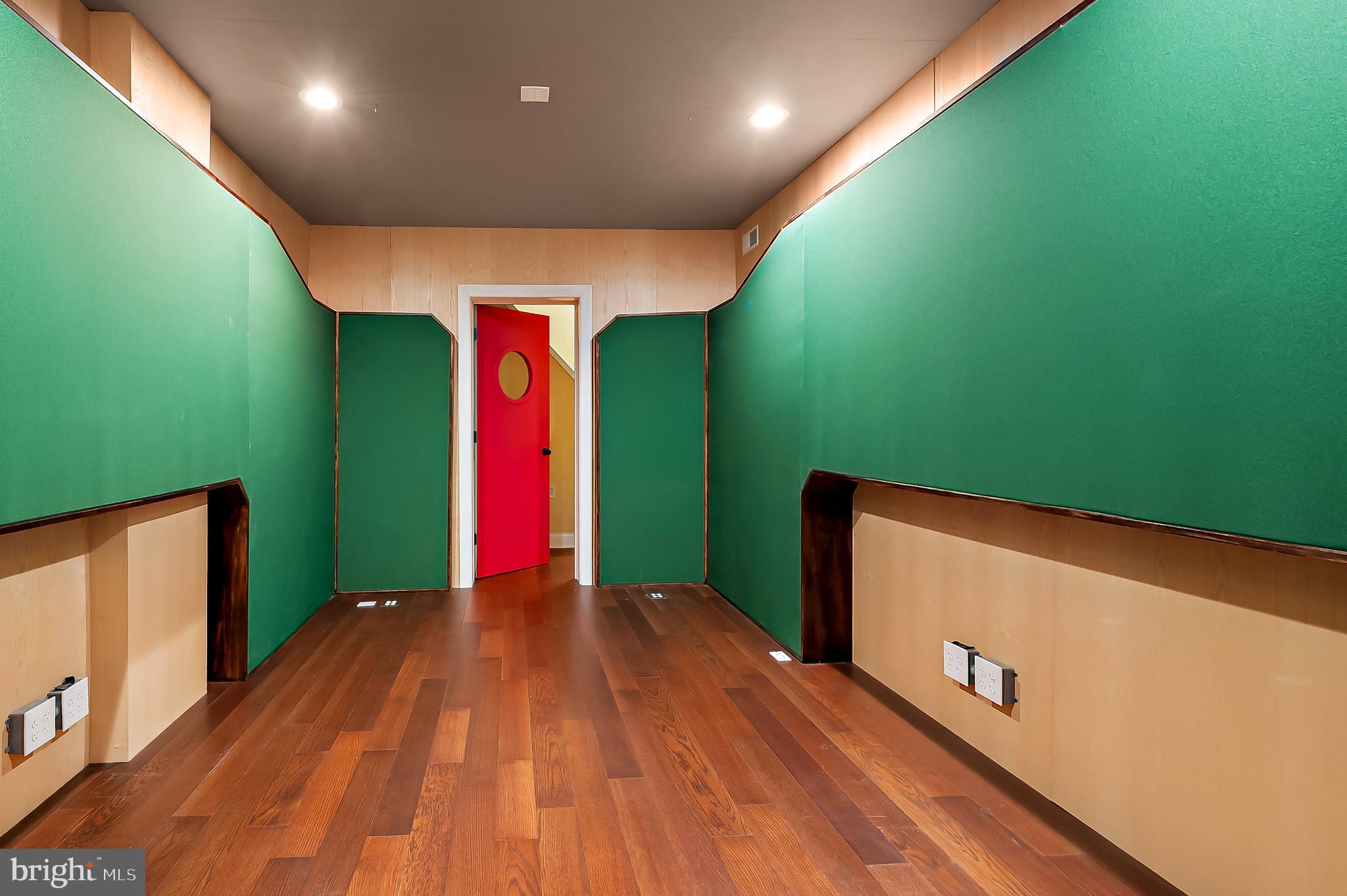 3137 Keswick Road Baltimore, MD 21211 - Photo 20 of 31 a view of a big room with wooden floor and windows