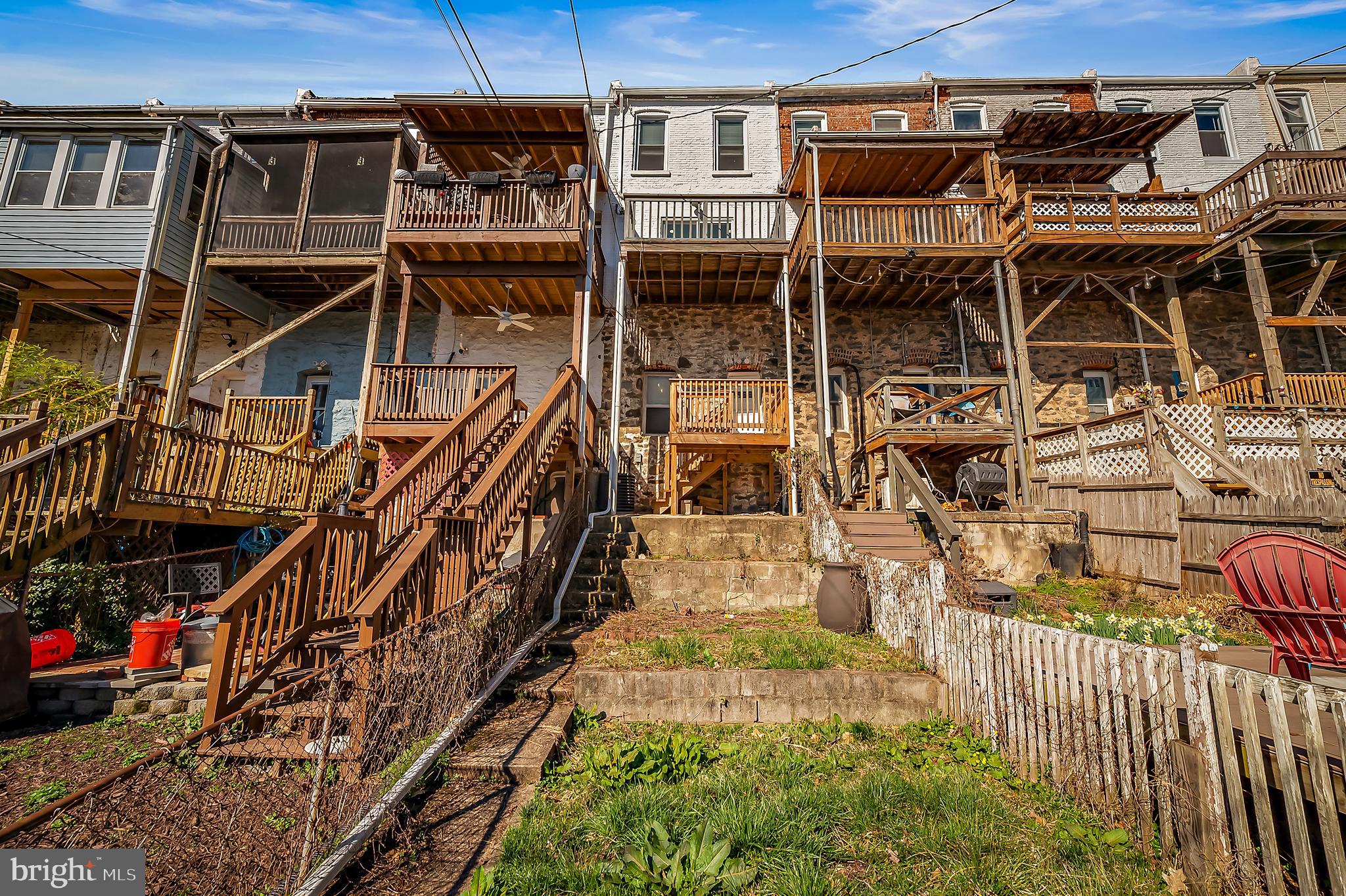3137 Keswick Road Baltimore, MD 21211 - Photo 27 of 31 a picture of a building with a yard