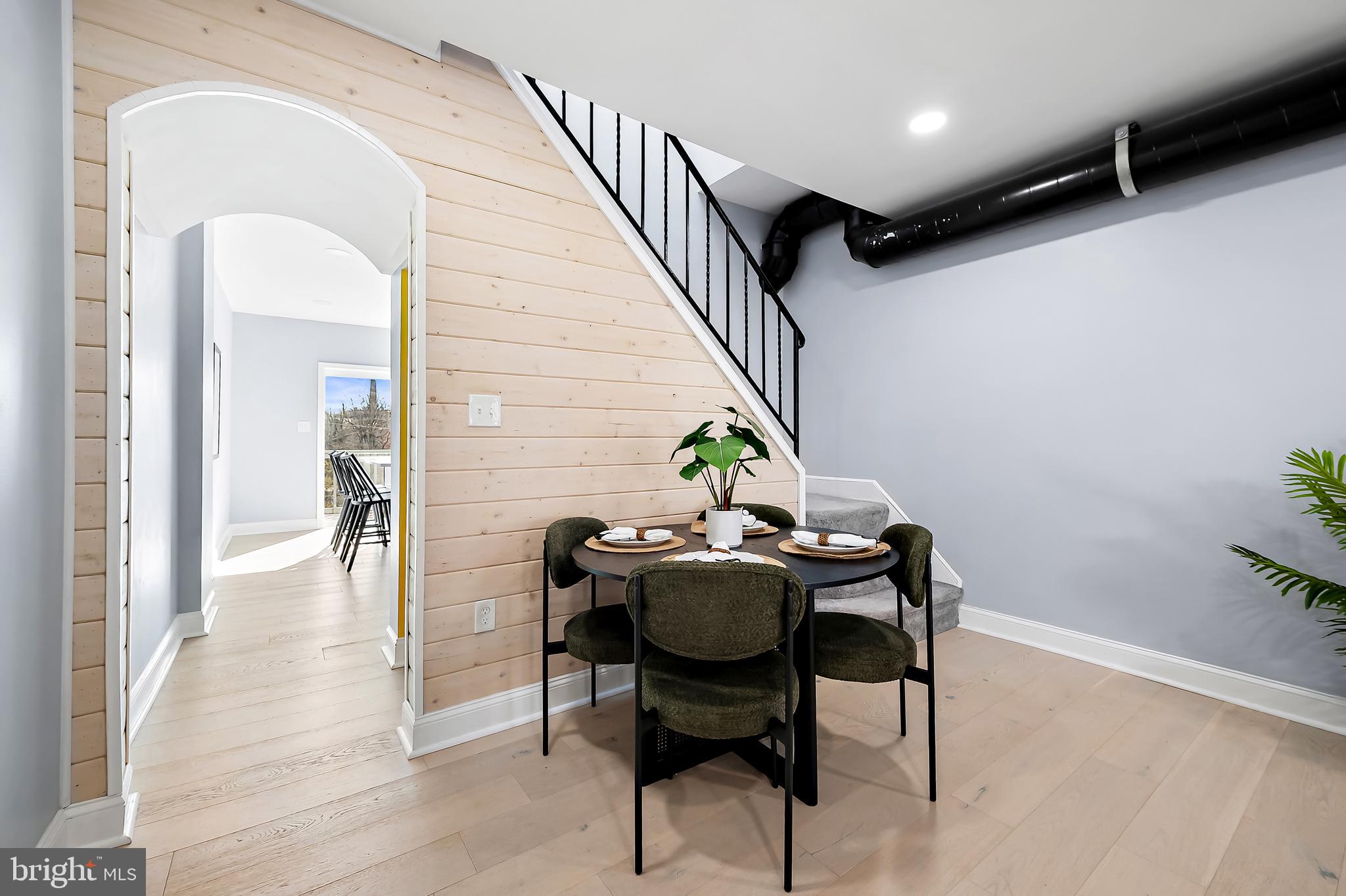 3137 Keswick Road Baltimore, MD 21211 - Photo 5 of 31 a view of a livingroom with furniture and wooden floor