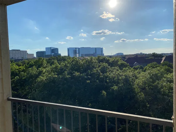 a view of a city from a balcony