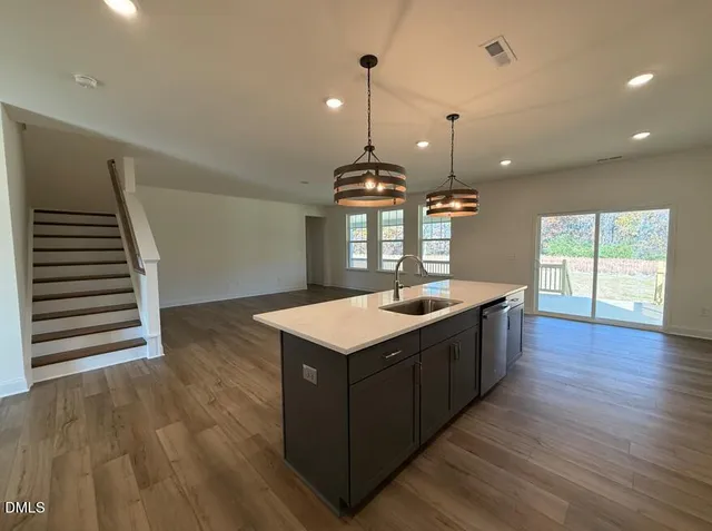 a view of wooden floor in an empty room