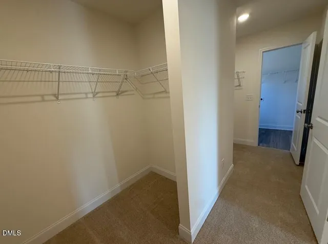 an empty room with a bench