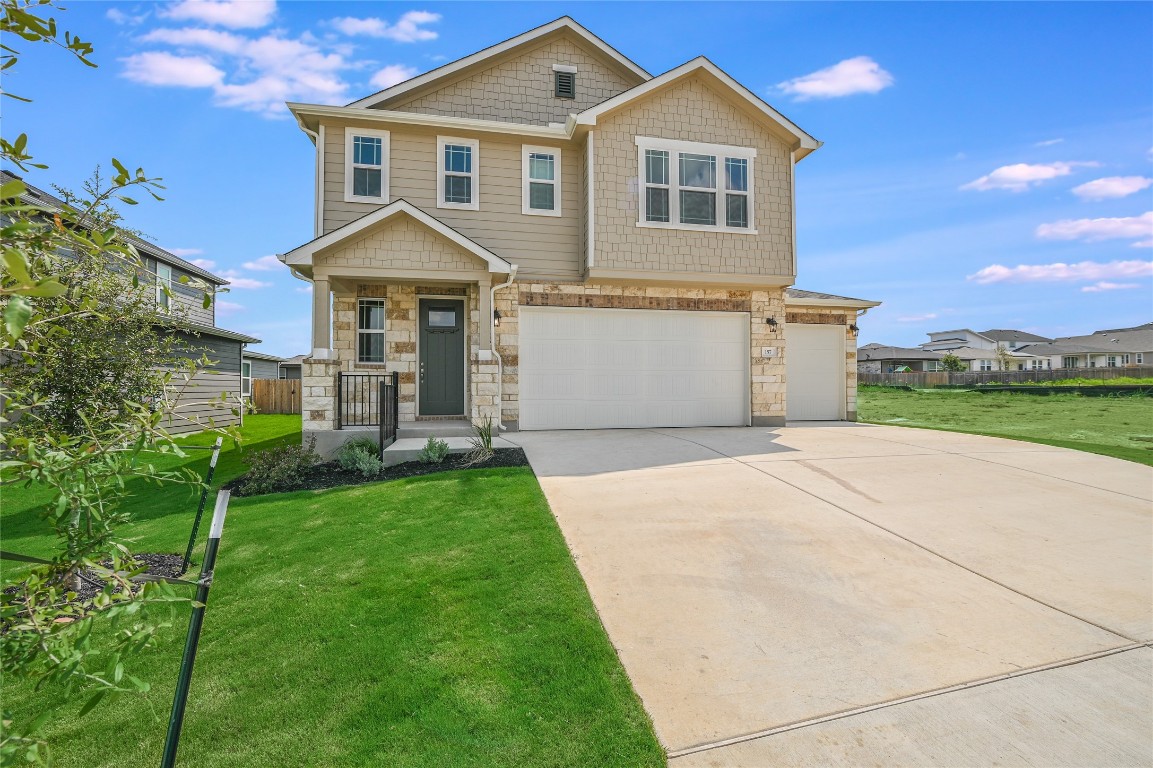 157 Seattle Slew Drive Jarrell, TX 76537 - Photo 1 of 1 a view of a house with a yard and large tree