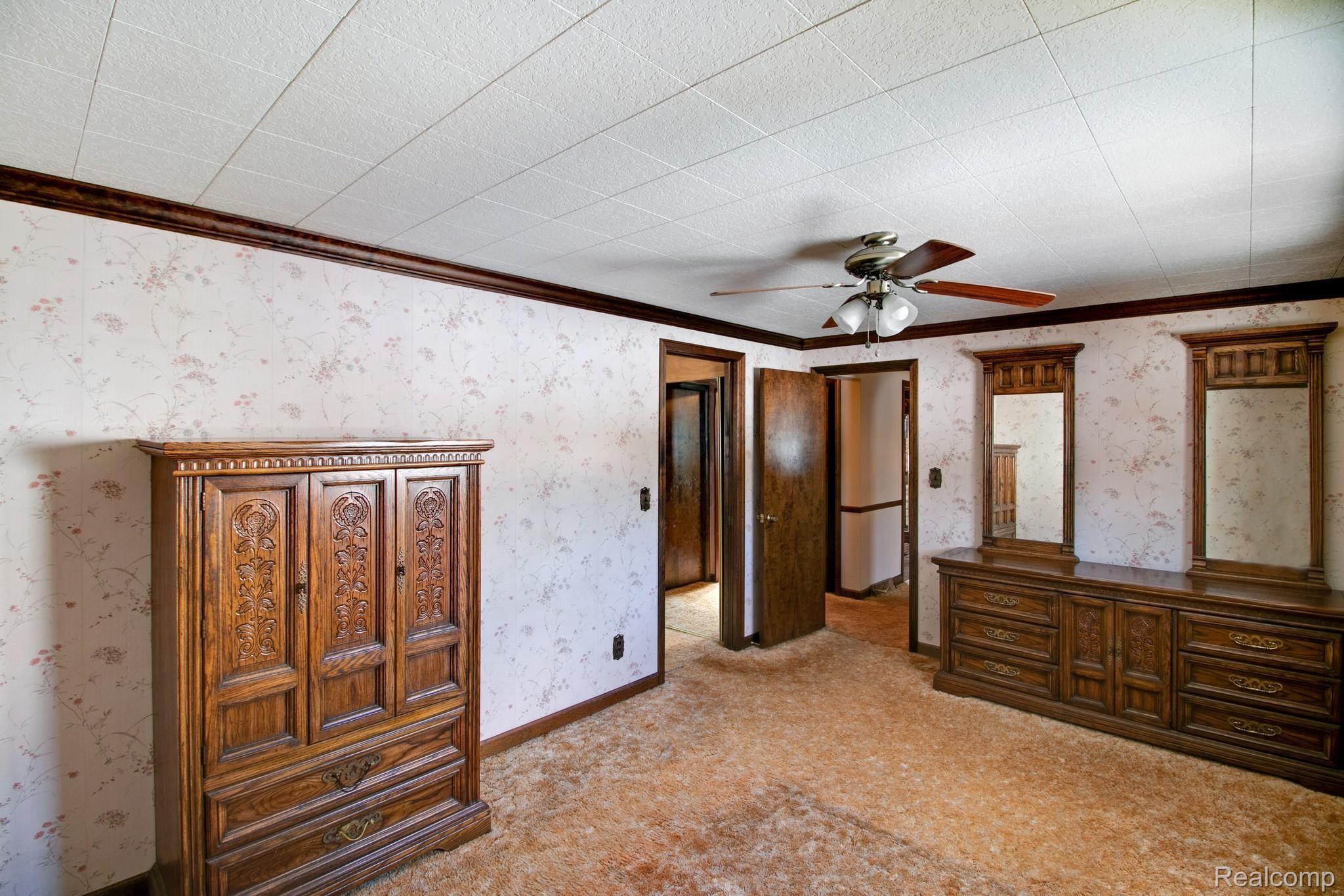 19754 Fry Road Northville, MI 48167 - Photo 22 of 35 Master bedroom. Walk-in closet and master bath through door on left.