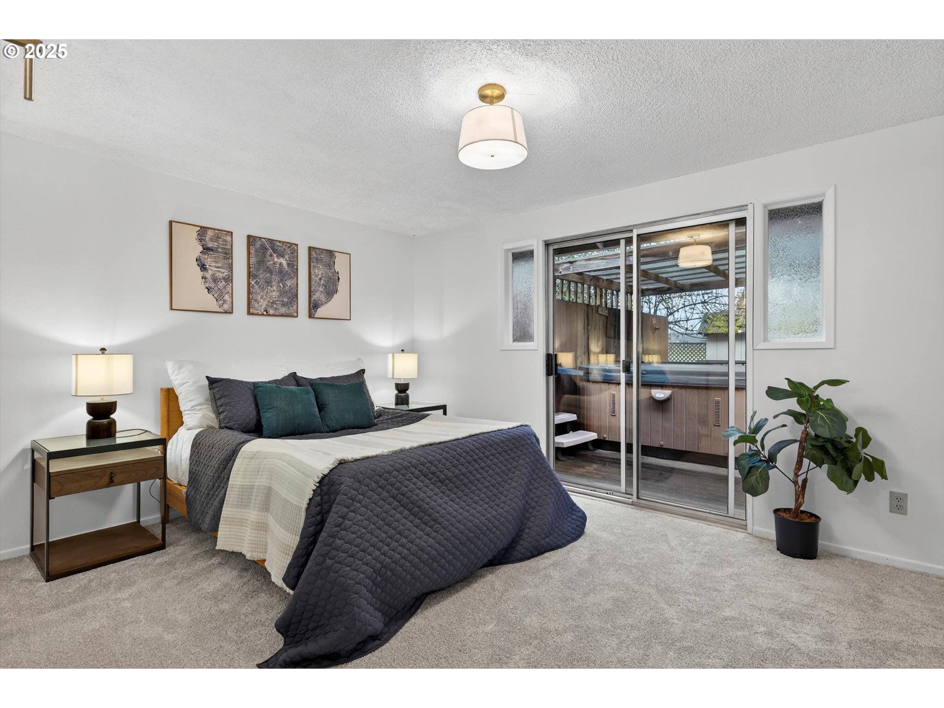 1204 North Elliott Road Newberg, OR 97132 - Photo 16 of 32 a bedroom with a bed and a large window
