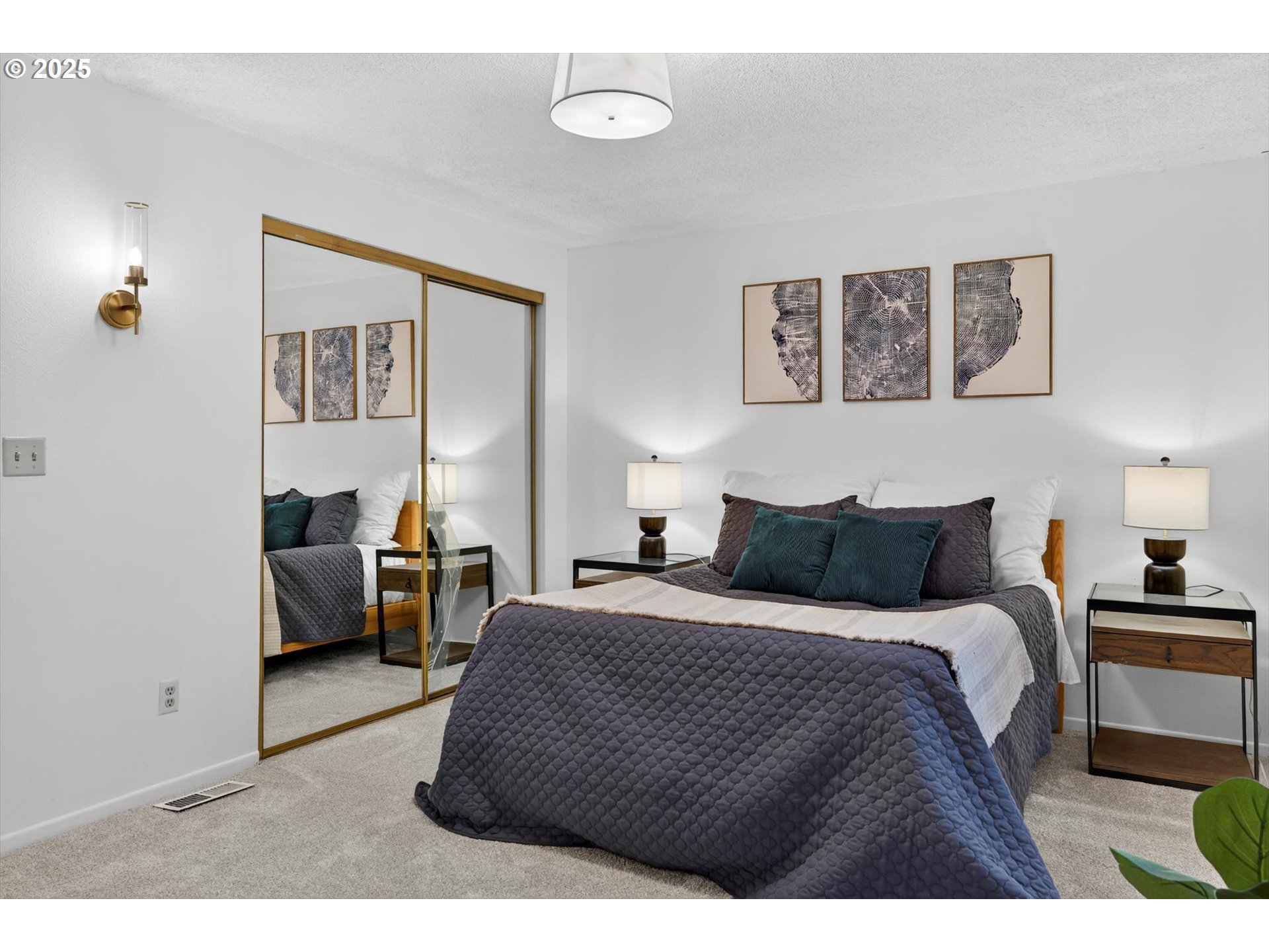 1204 North Elliott Road Newberg, OR 97132 - Photo 17 of 32 a bedroom with a bed and a couch