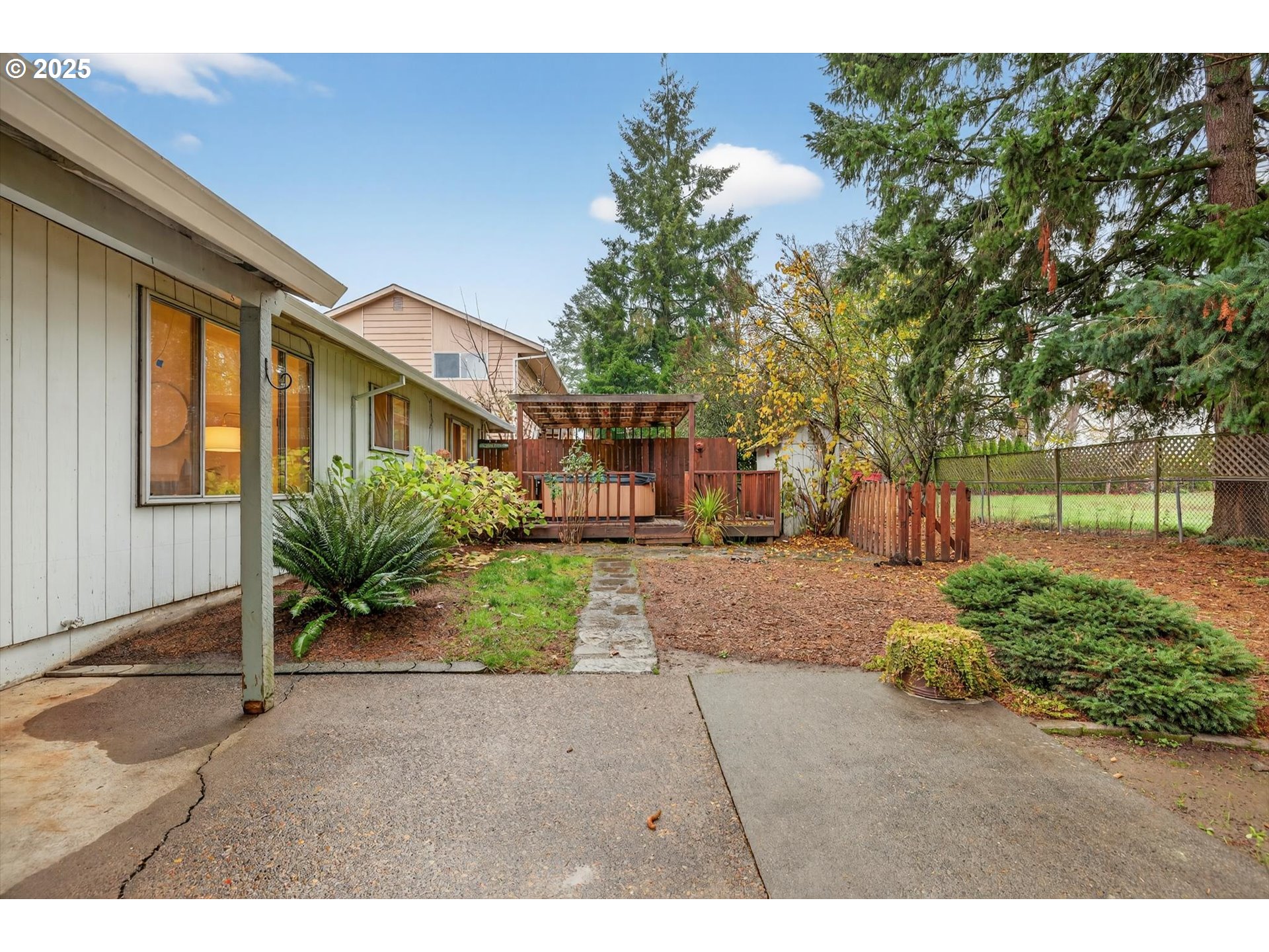 1204 North Elliott Road Newberg, OR 97132 - Photo 26 of 32 a view of a yard with plants and trees