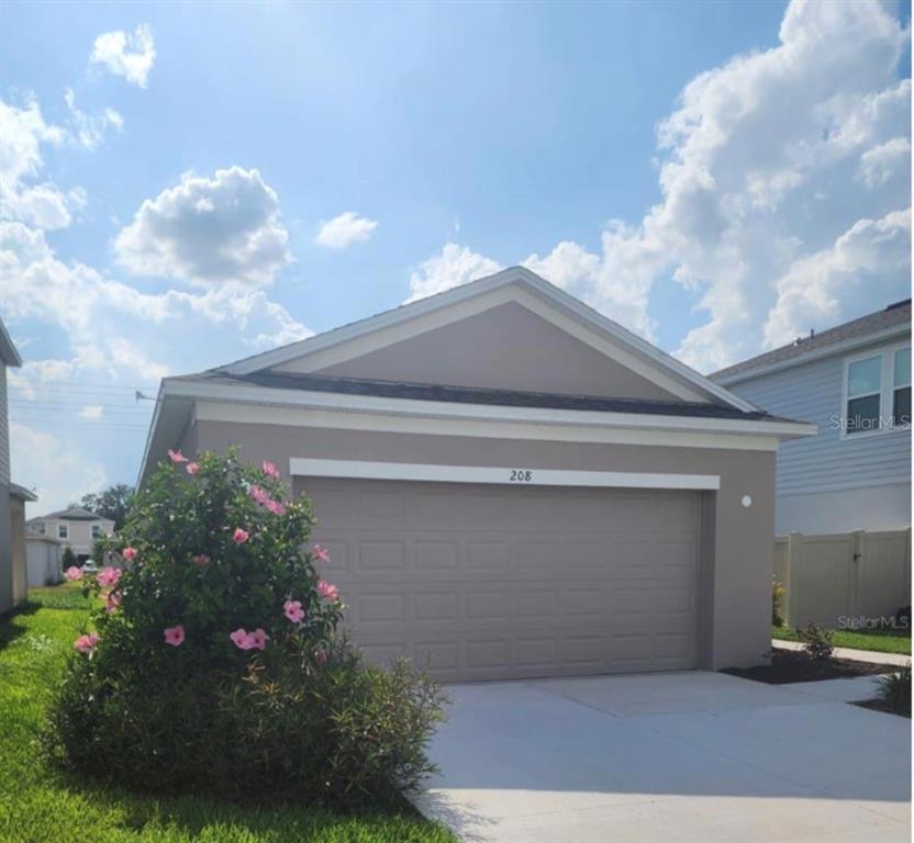 208 Acorn Road Haines City, FL 33844 - Photo 1 of 14 a front view of house
