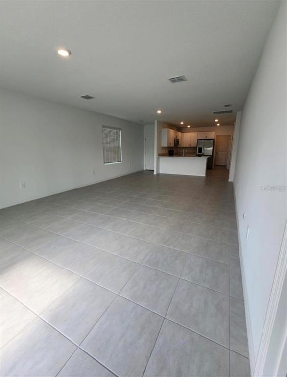 208 Acorn Road Haines City, FL 33844 - Photo 5 of 14 a view of room and window