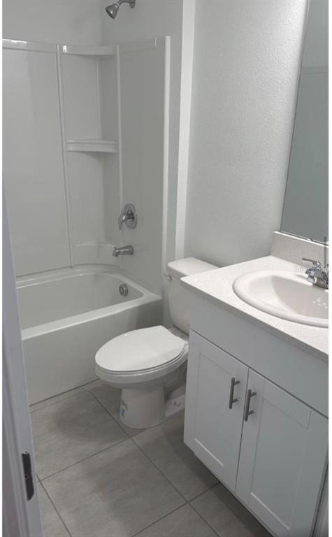 208 Acorn Road Haines City, FL 33844 - Photo 8 of 14 a bathroom with a sink a toilet and shower