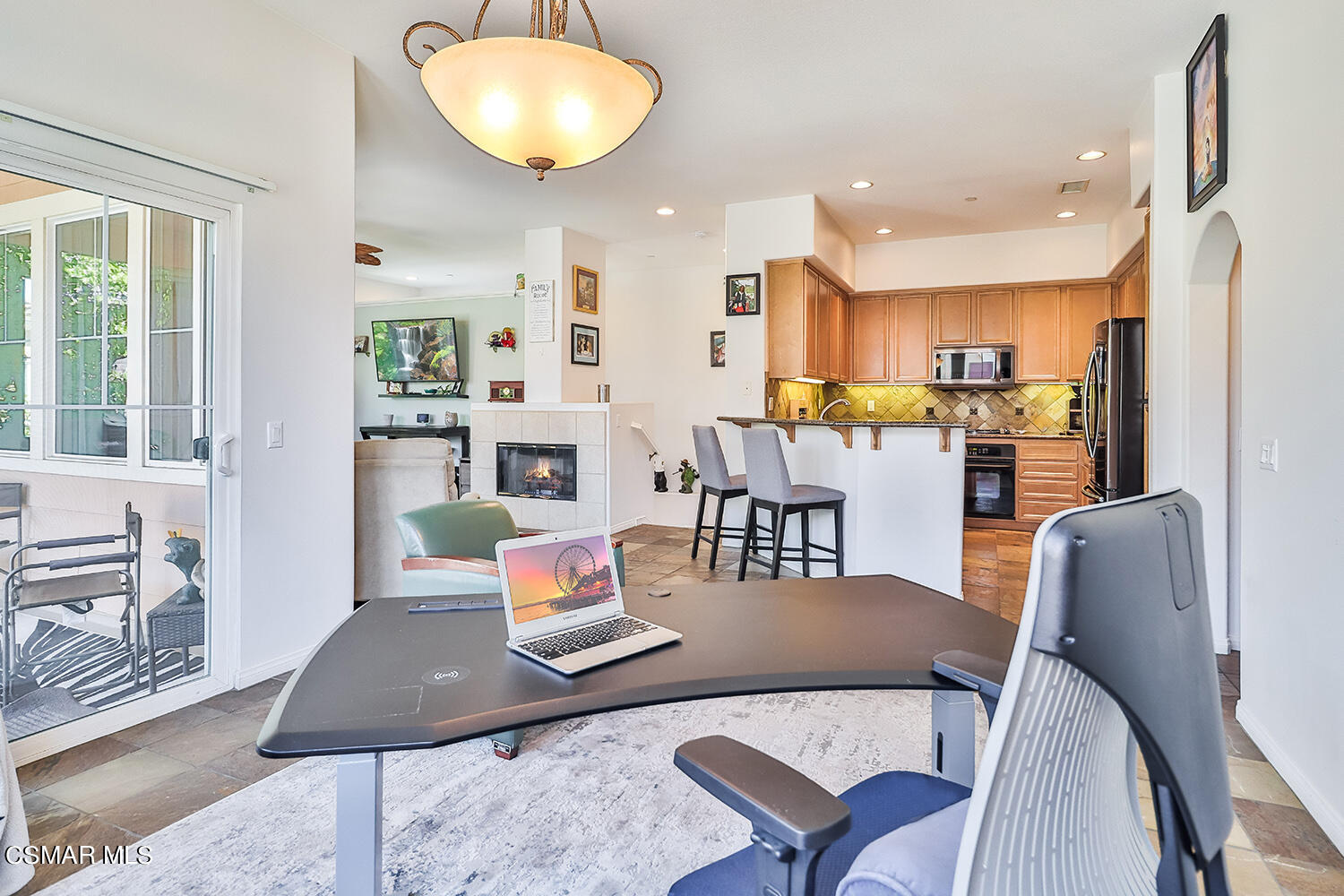 4106 Laredo Lane, Unit A Simi Valley, CA 93063 - Photo 14 of 42 a living room with dining room and kitchen view