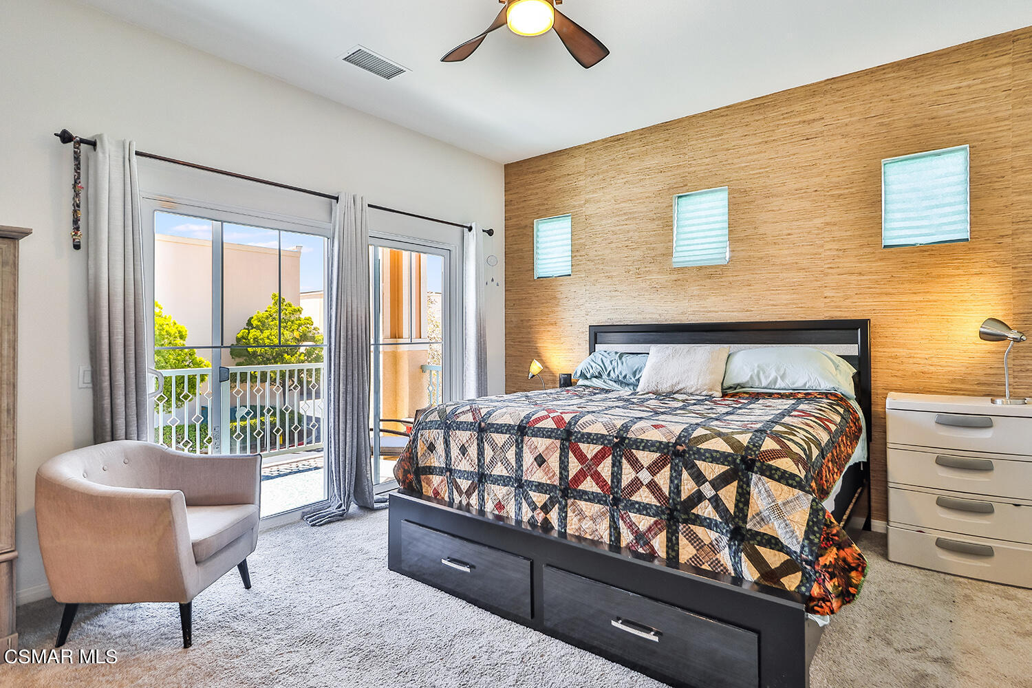 4106 Laredo Lane, Unit A Simi Valley, CA 93063 - Photo 23 of 42 a bedroom with a bed and a chair