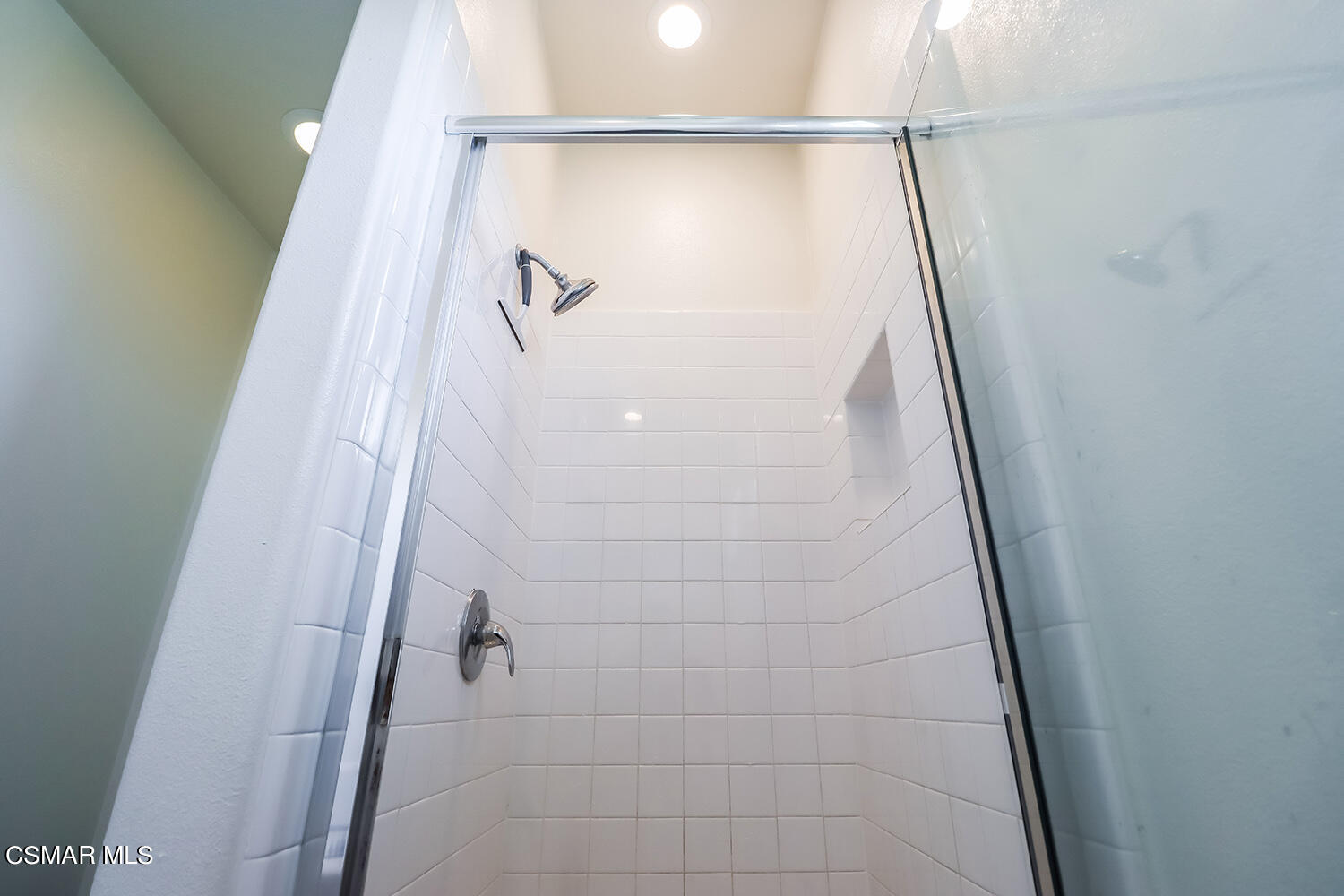 4106 Laredo Lane, Unit A Simi Valley, CA 93063 - Photo 30 of 42 a bathroom with a shower and a mirror