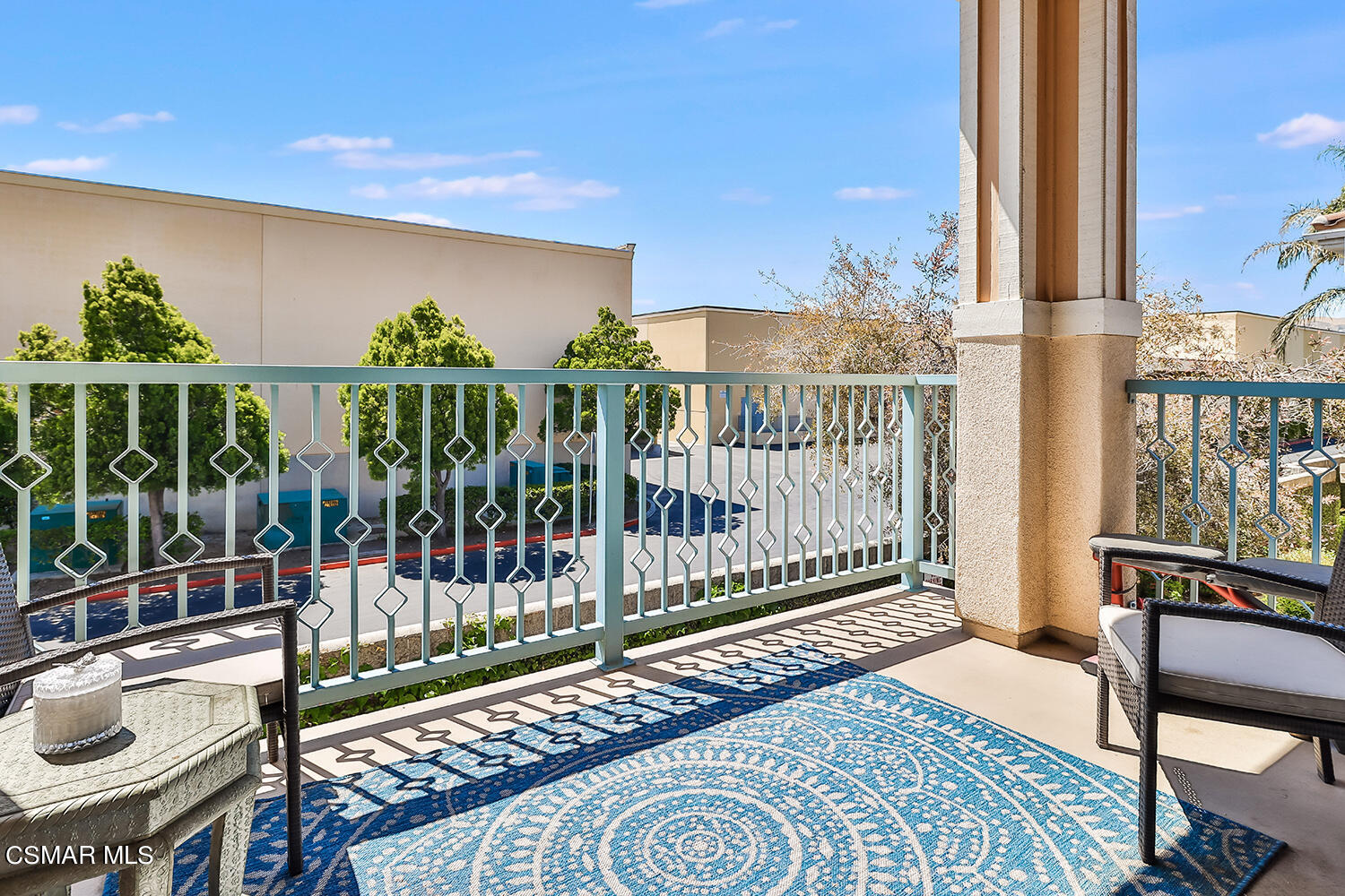 4106 Laredo Lane, Unit A Simi Valley, CA 93063 - Photo 31 of 42 a balcony with table and chairs