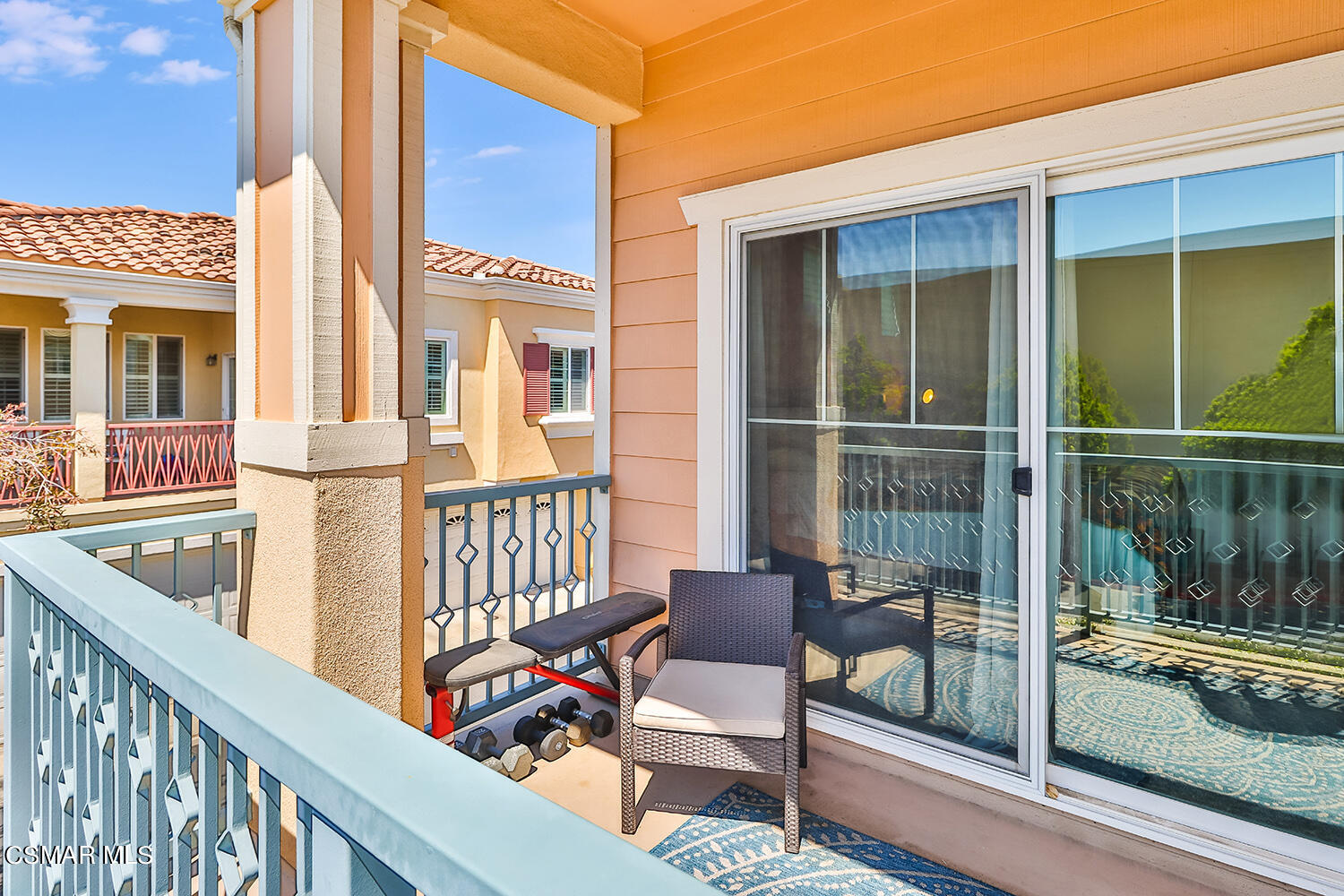 4106 Laredo Lane, Unit A Simi Valley, CA 93063 - Photo 33 of 42 a view of a balcony with chairs and wooden floor