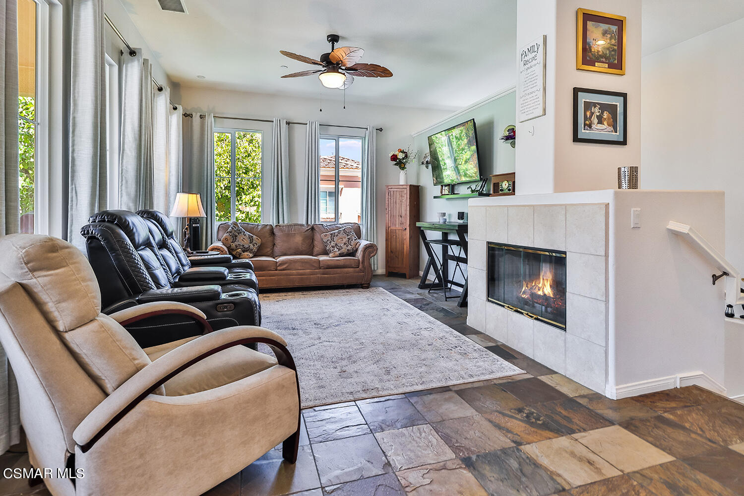 4106 Laredo Lane, Unit A Simi Valley, CA 93063 - Photo 4 of 42 a living room with furniture and a fireplace