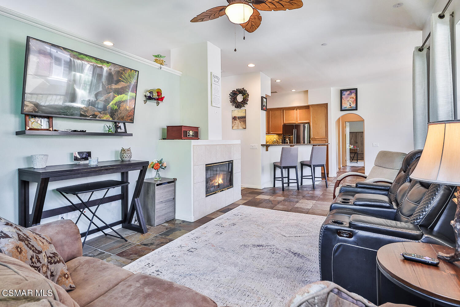 4106 Laredo Lane, Unit A Simi Valley, CA 93063 - Photo 6 of 42 a living room with furniture a flat screen tv and kitchen view