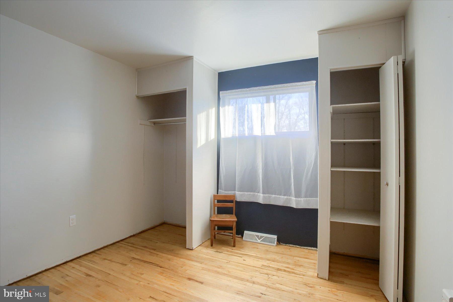 5404 Laurie Lane Enola, PA 17025 - Photo 11 of 29 a view of an empty room with wooden floor and closet
