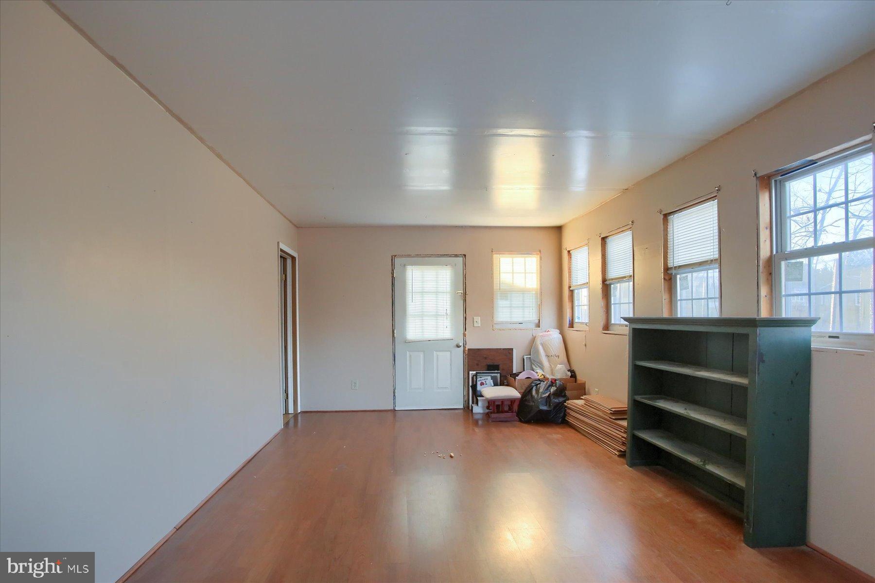 5404 Laurie Lane Enola, PA 17025 - Photo 23 of 29 a view of room with window and hardwood floor