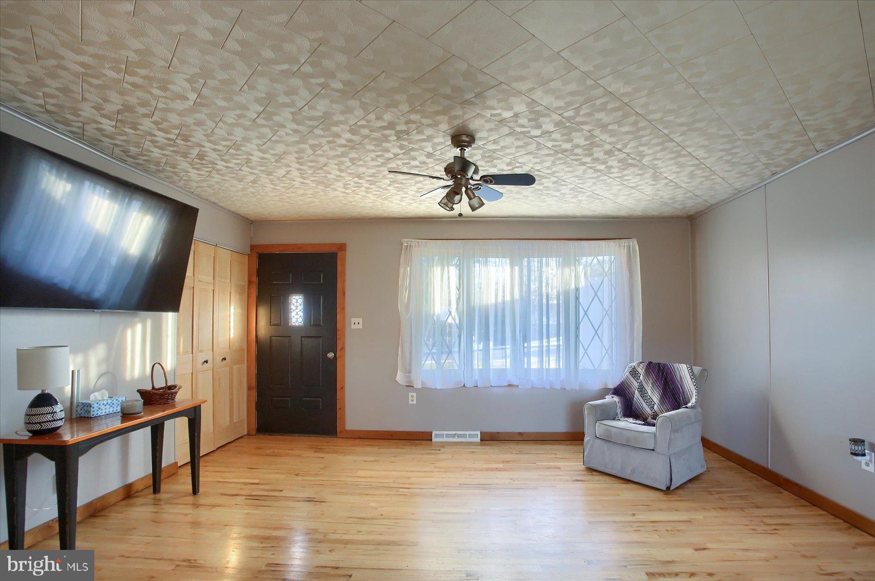 5404 Laurie Lane Enola, PA 17025 - Photo 5 of 29 a living room with furniture and a wooden floor