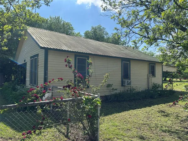 front view of house with a yard