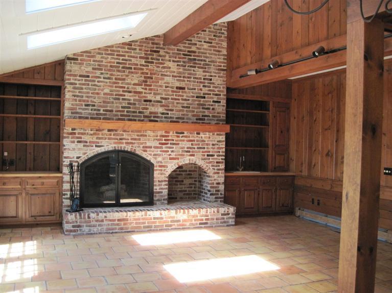 105 Ice Valley Road Osterville, MA 02655 - Photo 10 of 32 a view of fireplace and window