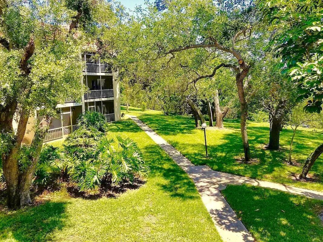 610 Northwest 13th Street, Unit 23 Boca Raton, FL 33486 - Photo 24 of 28 a view of yard with swimming pool