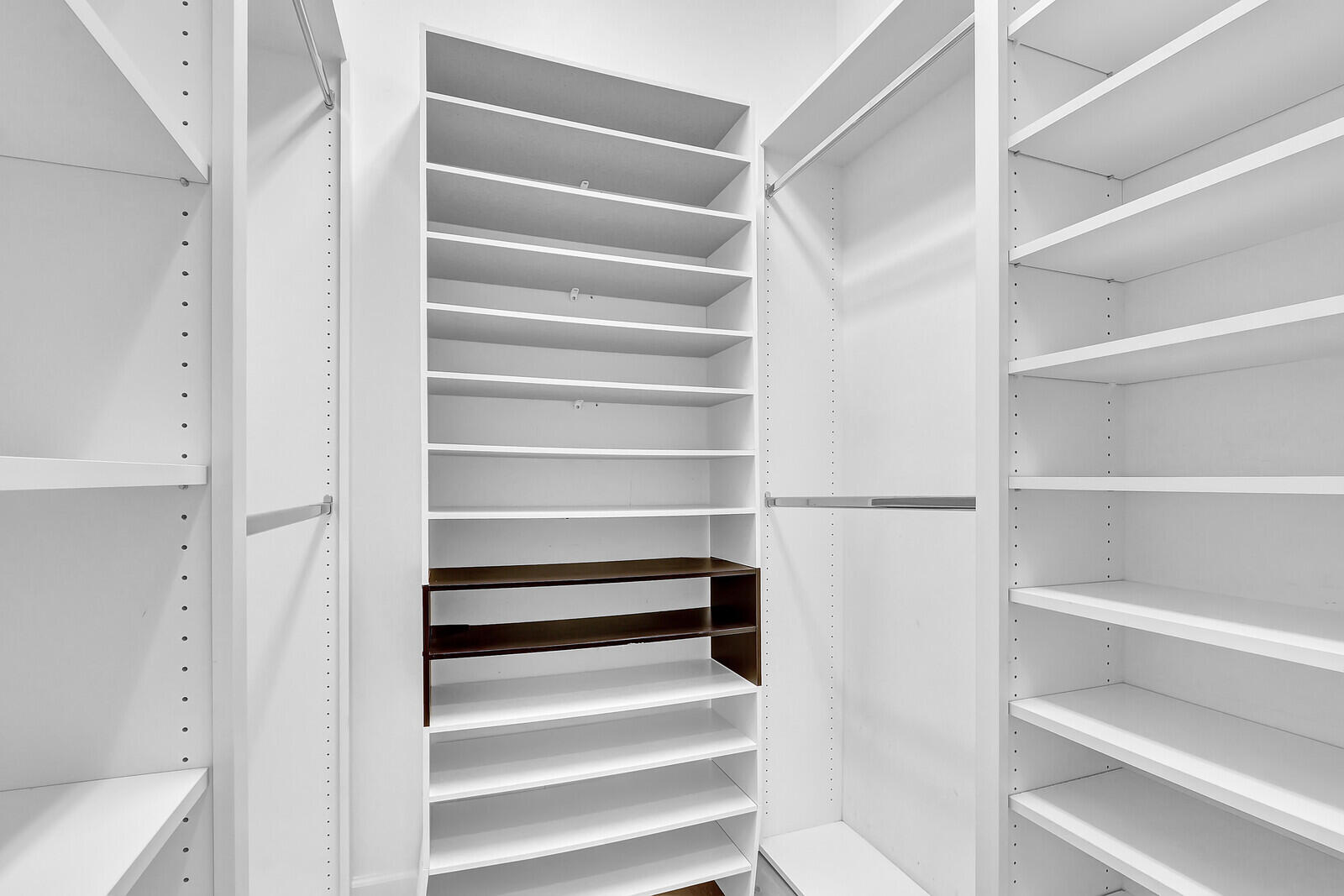 199 Barbados Drive Jupiter, FL 33458 - Photo 23 of 38 a view of walk in closet with empty racks