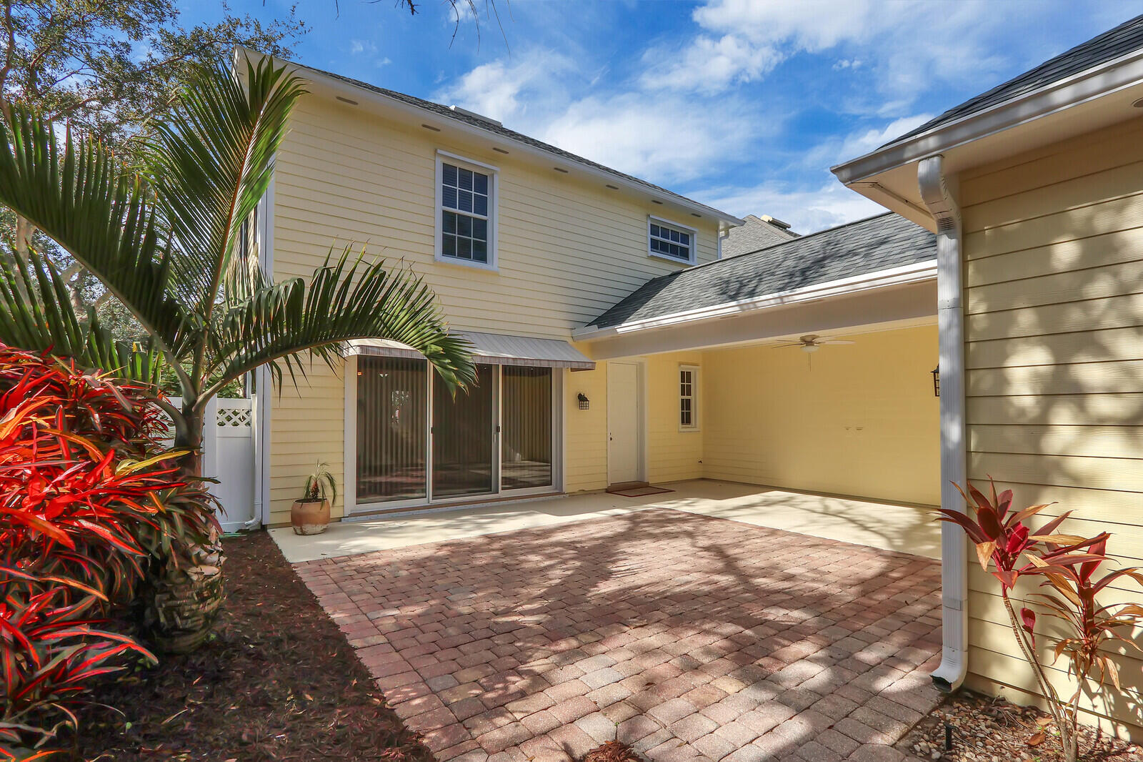 199 Barbados Drive Jupiter, FL 33458 - Photo 33 of 38 a front view of a house with a garage