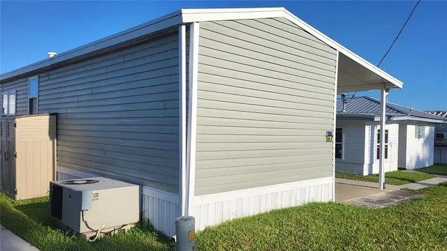 a front view of a house with garage