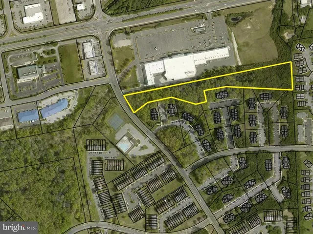 an aerial view of a residential building