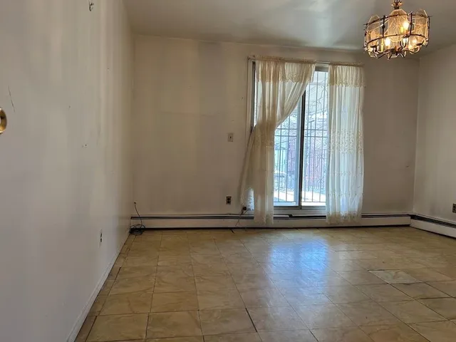 a view of a room with windows