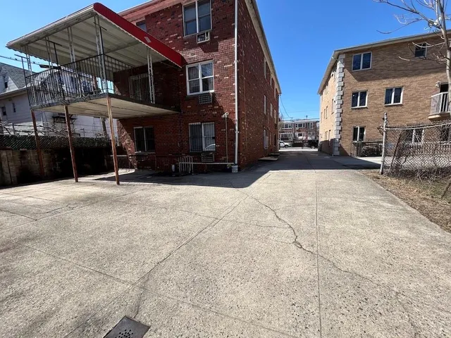 a view of balcony with furniture