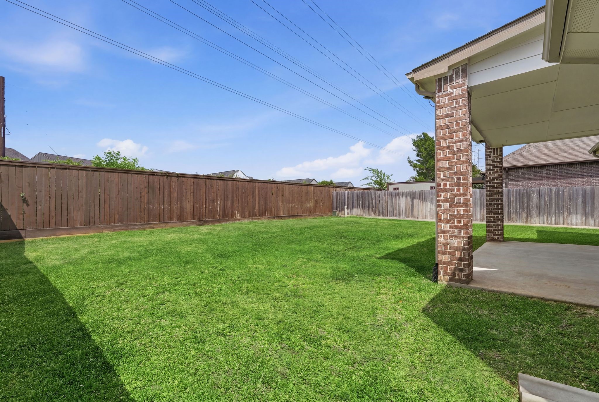 7522 Windsor View Drive Spring, TX 77379 - Photo 47 of 49 Covered patio that’s perfect for relaxing outside and enjoying the fresh air.