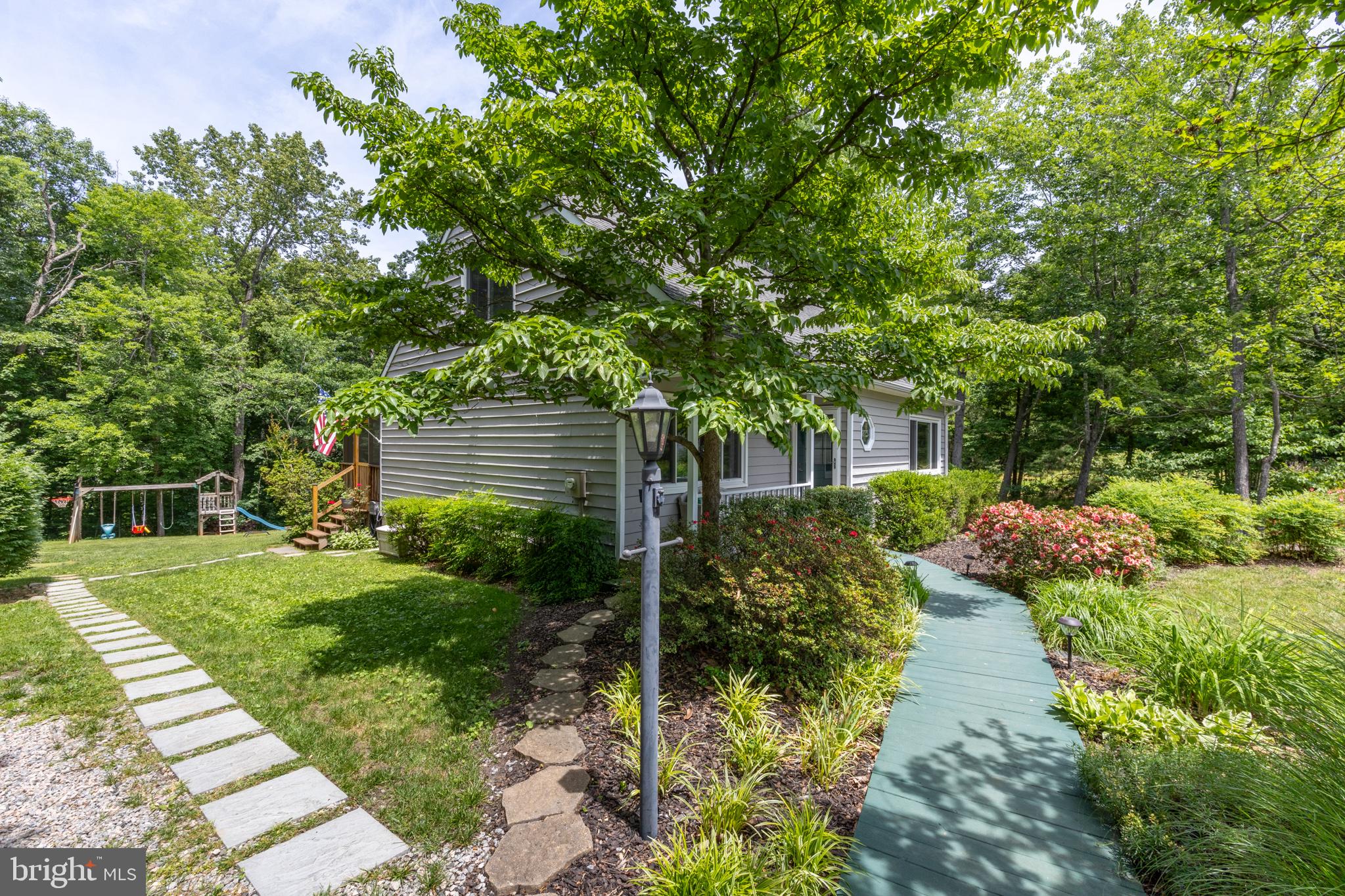 164 Oliver Lane Ruckersville, VA 22968 - Photo 4 of 39 Serene home nestled in lush greenery.