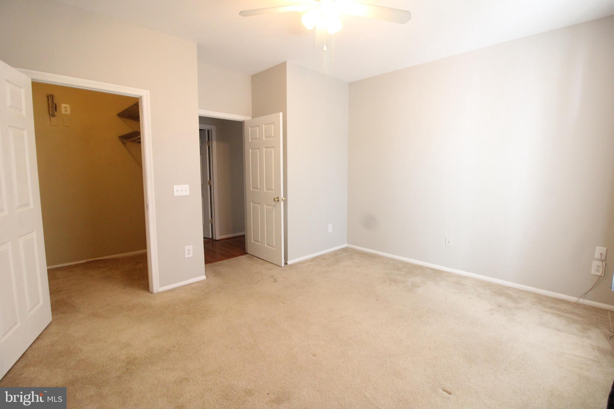 1570 Spring Gate Dr., Unit 7108 McLean, VA 22102 - Photo 13 of 21 an empty room with closet