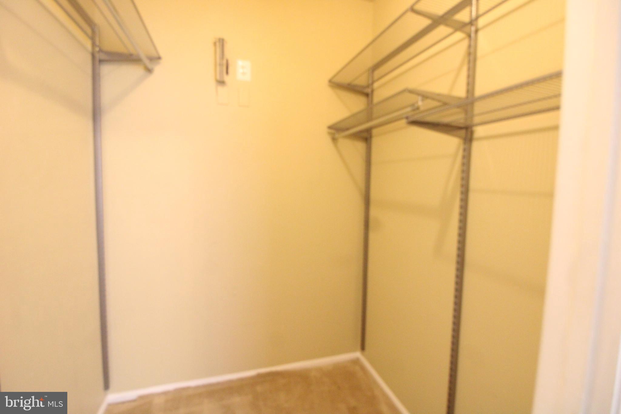 1570 Spring Gate Dr., Unit 7108 McLean, VA 22102 - Photo 18 of 21 a bathroom with a shower
